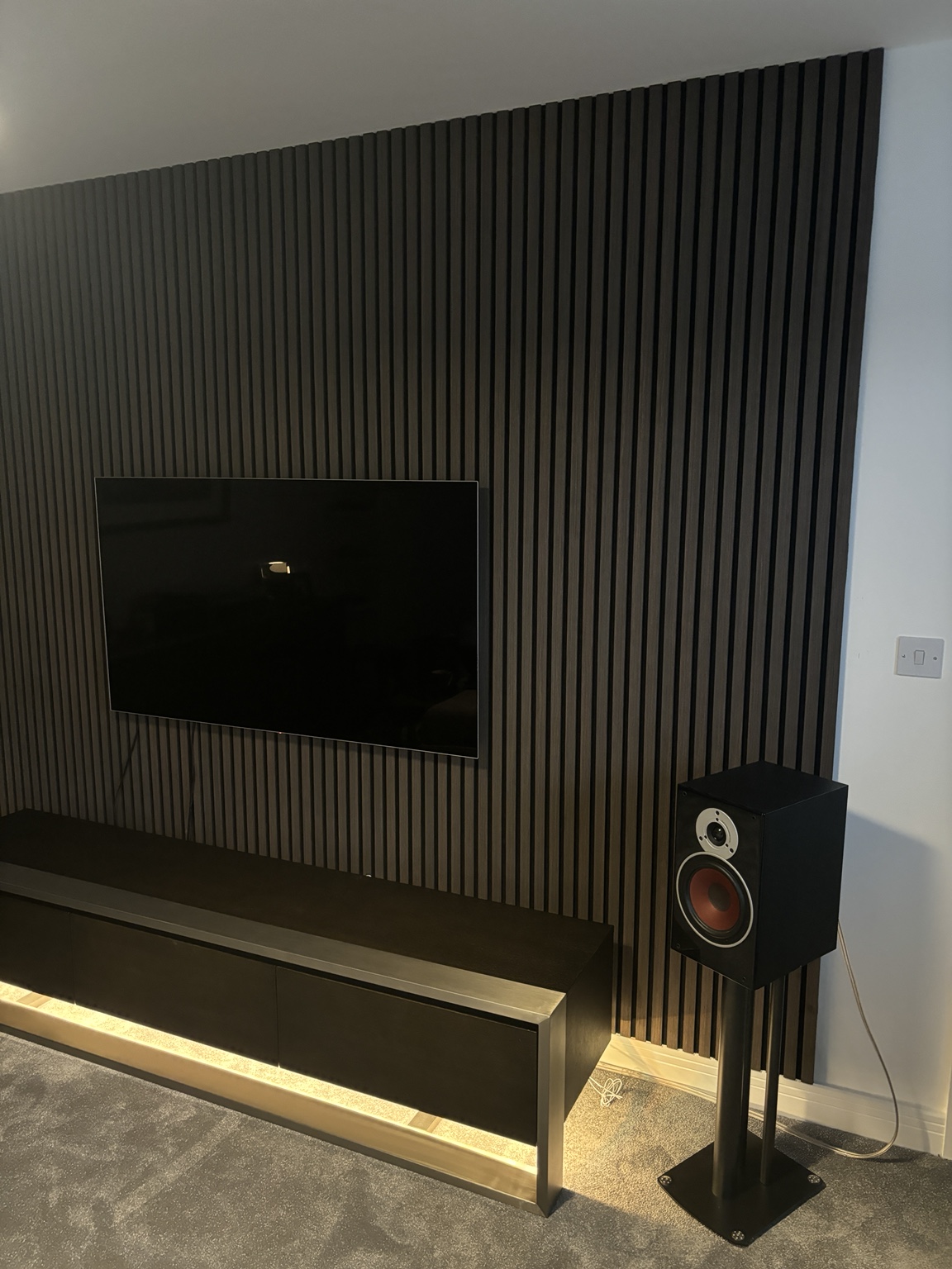 Slatted media wall by BHA